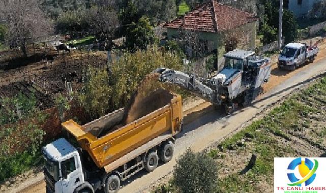 Aydın Büyükşehir Belediyesi Germencik Üzümlü – Moralı ortasında yol üretim çalışmalarına devam ediyor
